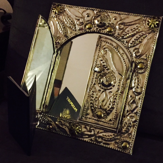 My passport meets a Mexican mirror and ponders what magic and mystery may lie on the other side of adventure
