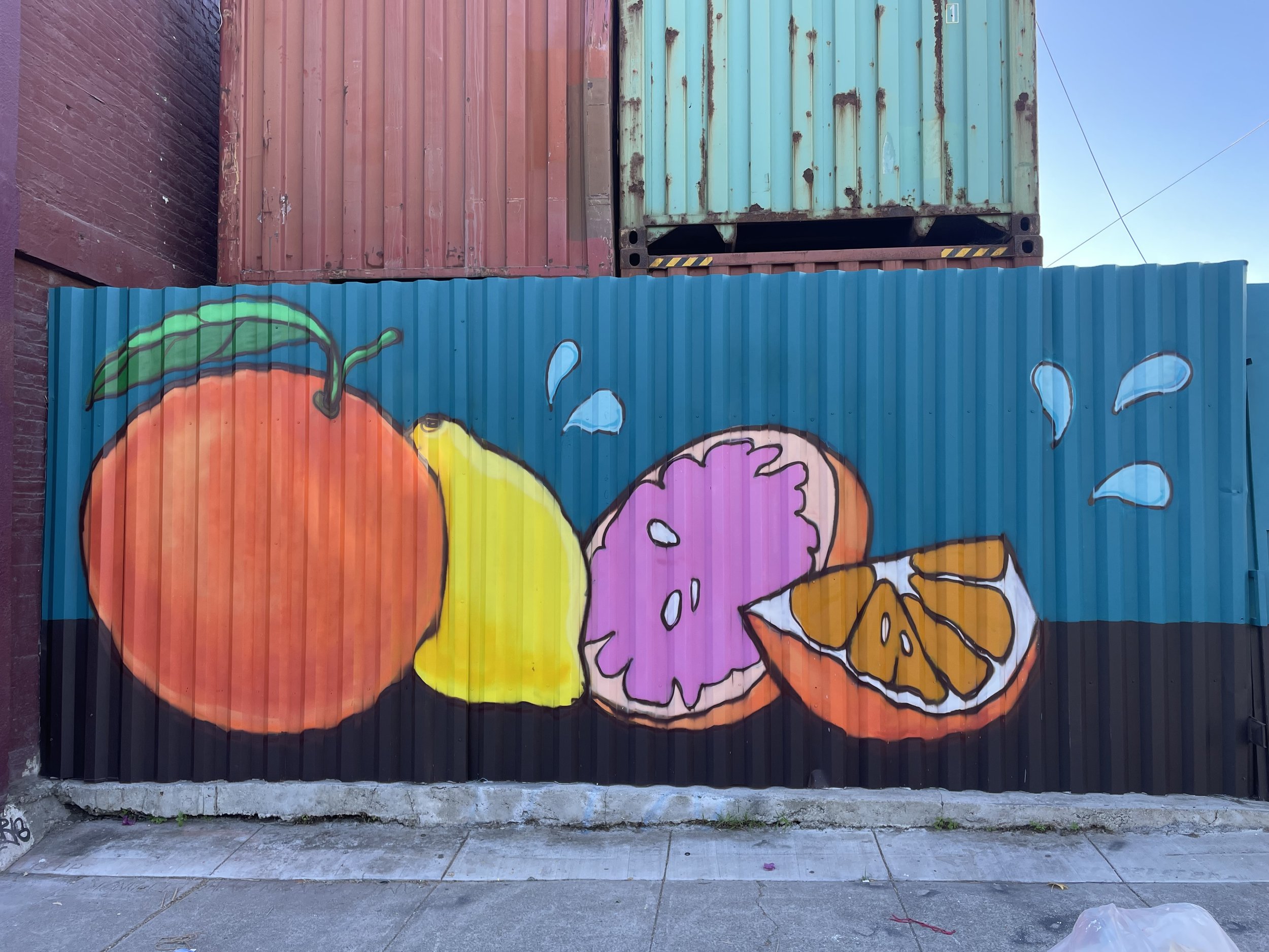 detail of citrus pile to left of rolling gate.