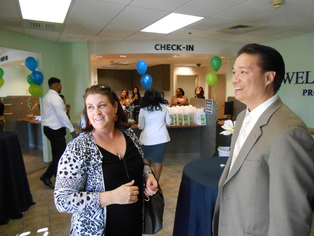 Psychiatrist Marian Orr talks with Well Care founder Marce Casal at the opening of the Well Care Services Center at Tropicana Avenue and Boulder Highway