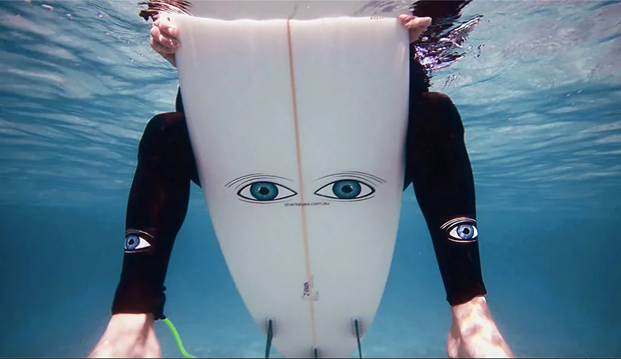 Black Eyes, Like A Doll’s Eyes... On A Surfboard