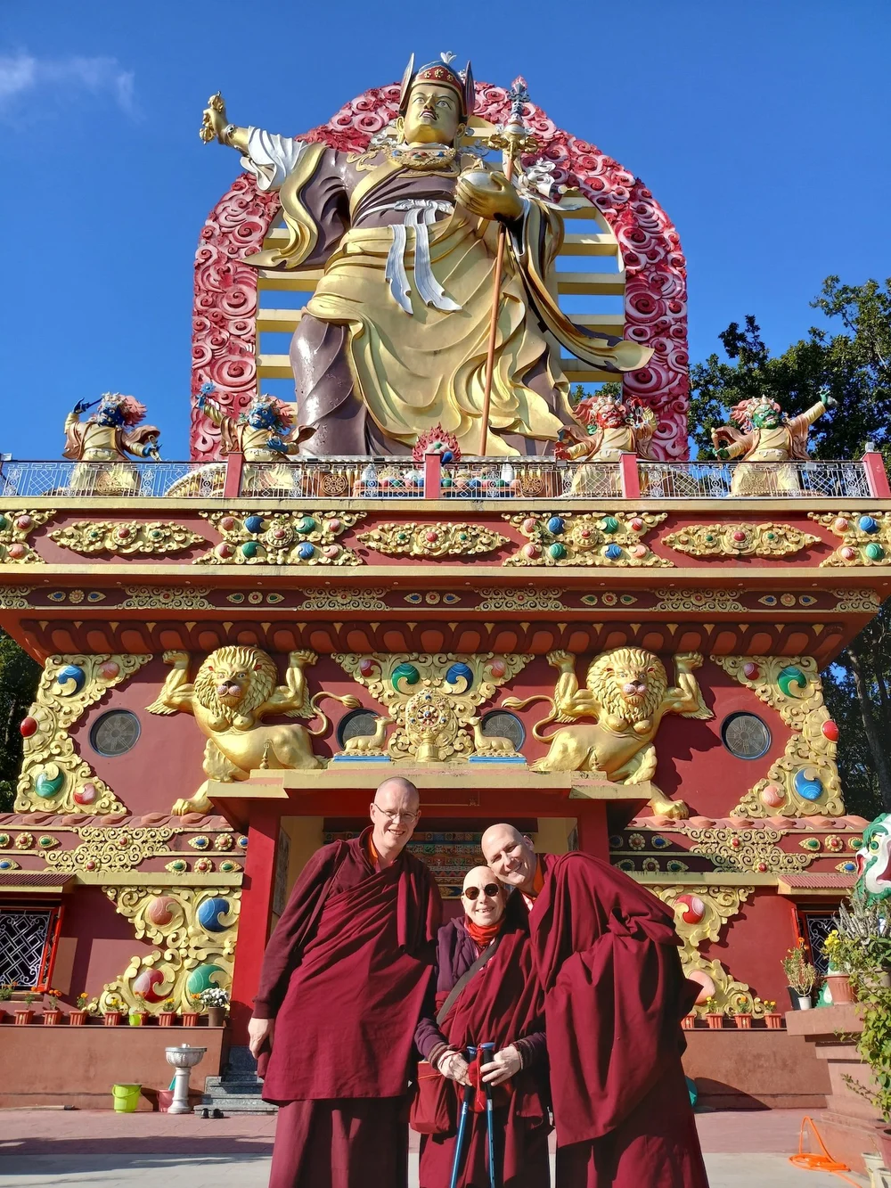Rigpa monastics at Guru Rinpoche statue, Mindrolling