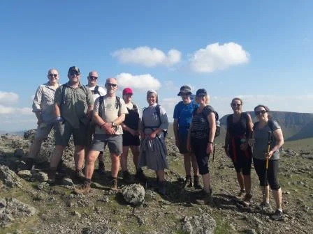 Group (with Fr John) Raise.jpg