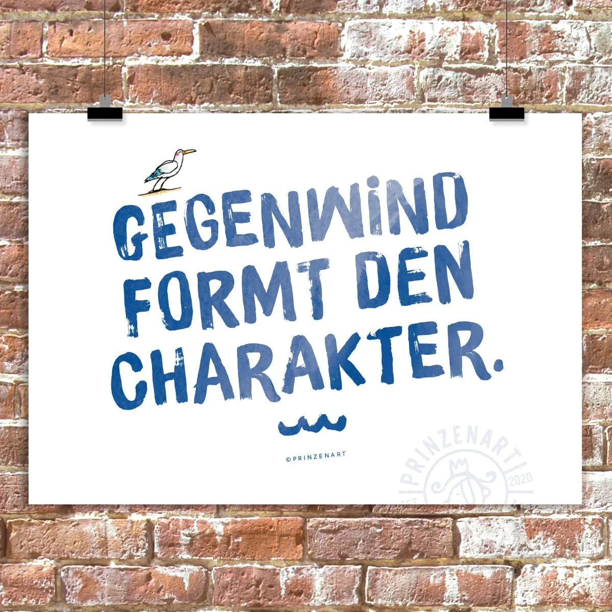 weißes Poster mit blauer Schrift an Clips, Spruch: Gegenwind formt den Charakter