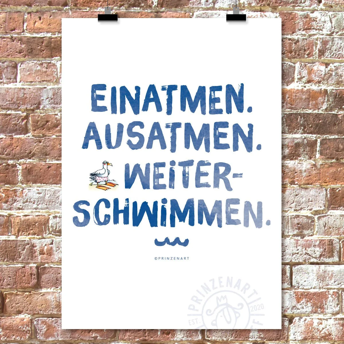 weißes Poster mit blauer Schrift an Clips, Spruch: Einatmen, ausatmen, weiterschwimmen