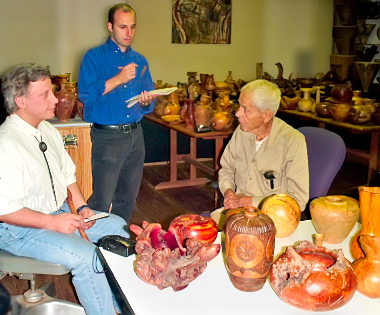 Albert LeCoff and Glenn Adamson visit Mel Lindquist in the Florida studio he shared with his son Mark Lindquist . Photo: Lindquist Studios