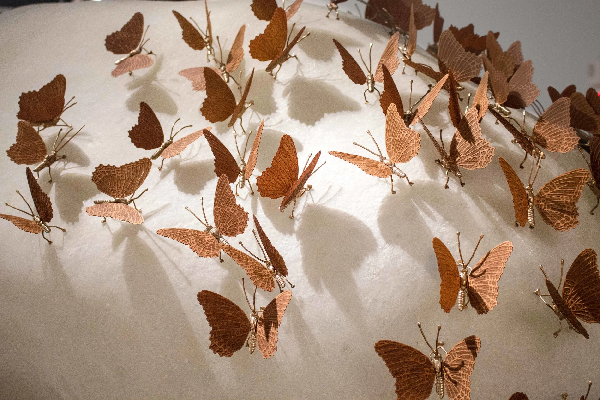 David Nosanchuk , Butterfly Asteroid , 2016 (detail). Beech veneer, bronze, fiberglass, LED illumination. 34 x 36 x 72 in. Courtesy of the Artist. 2016.DN.01. Photo: John Carlano METHOD: Laser engraving and cutting, CNC router, 3D scanning and printing, lost wax casting, hand applied fiberglass, hand applied finishing