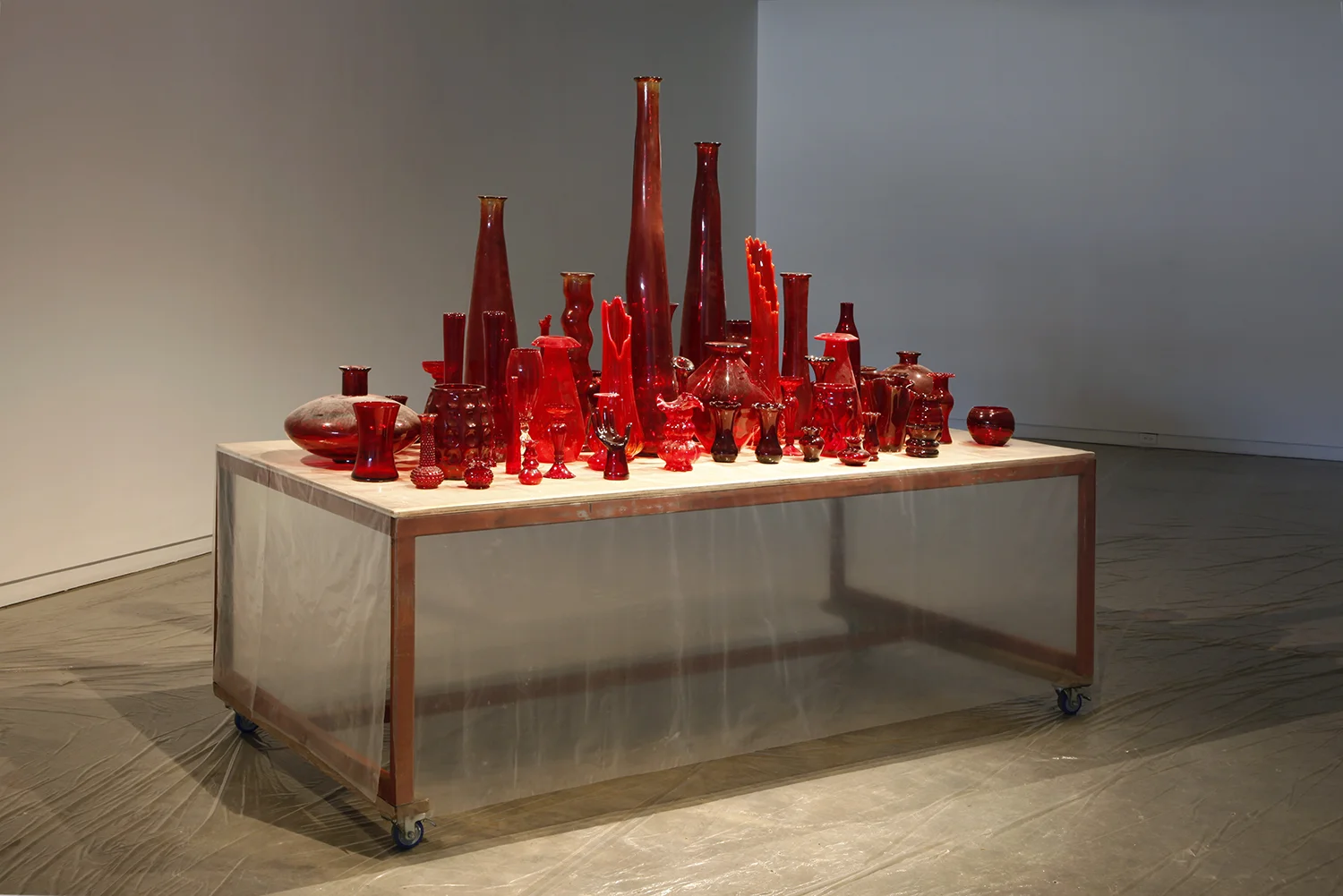 Red Vase Collection (ongoing) glass, size variable Installation view at Scrap Metal, Toronto, Canada