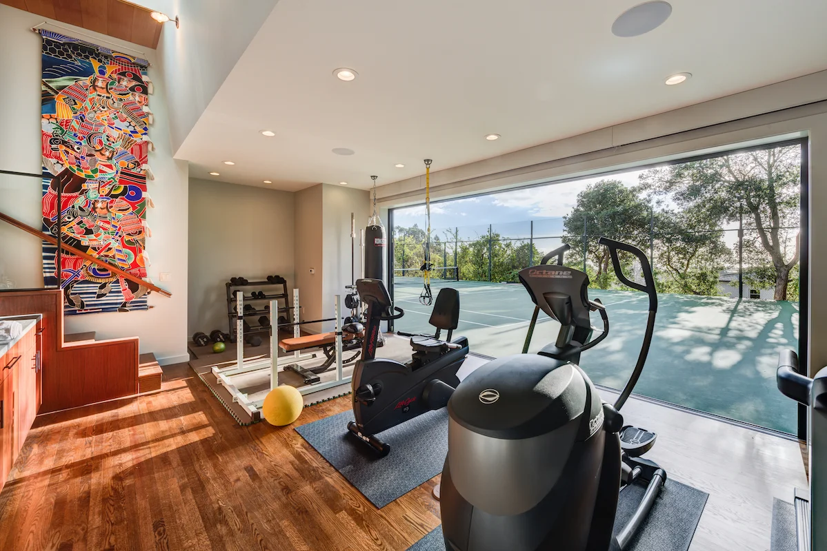 Gym and party space. Piedmont, California. Architecture by Studio Bergtraun Architects. Photography by Treve Johnson. From the book Your Creative Haven by Donald M. Rattner (Skyhorse Publishing, 2019).