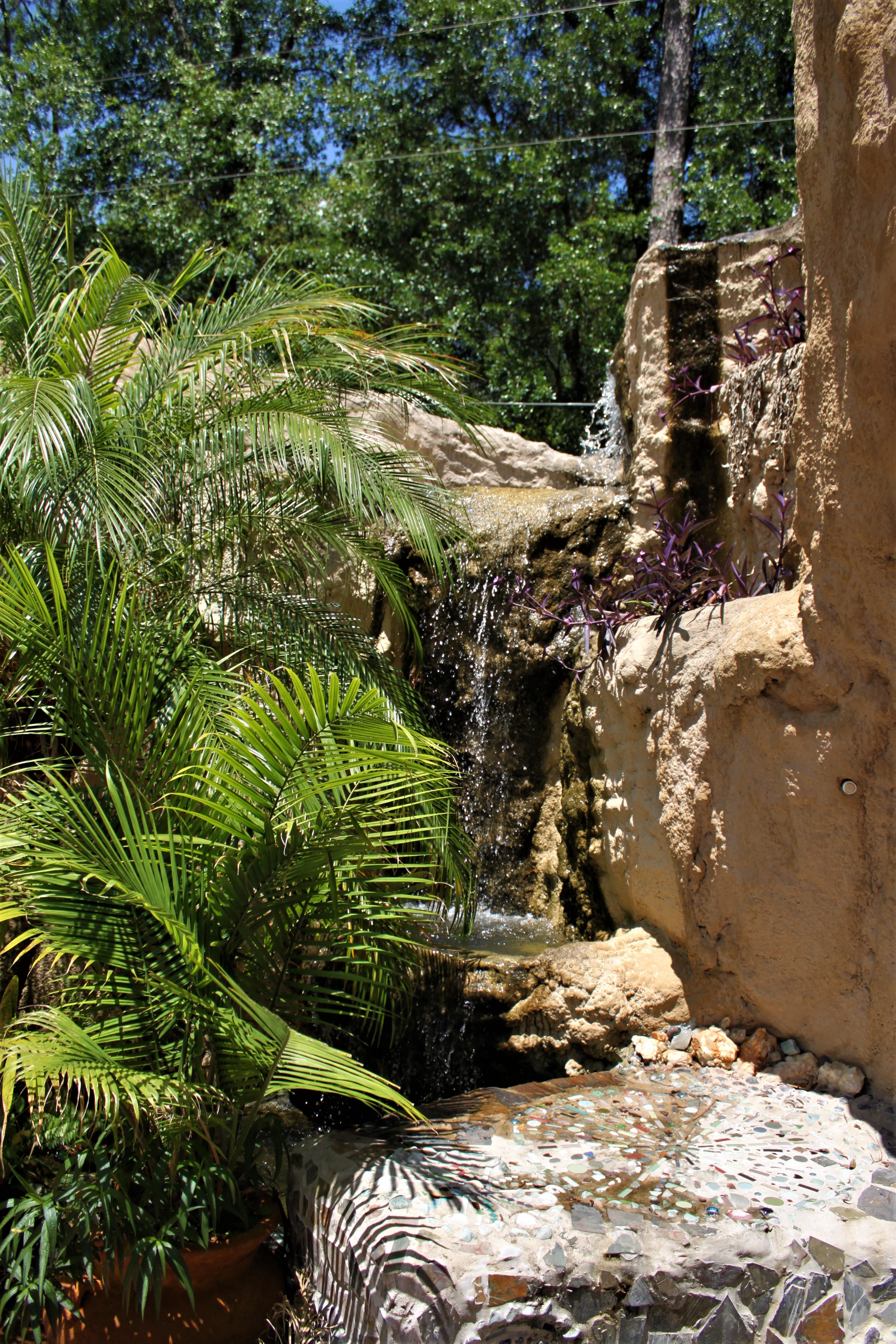This is a waterfall by the hot tub.