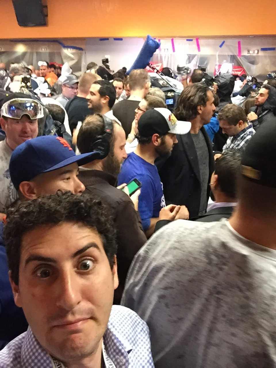 In the Royals clubhouse after their World Series win, with Paul Rudd.