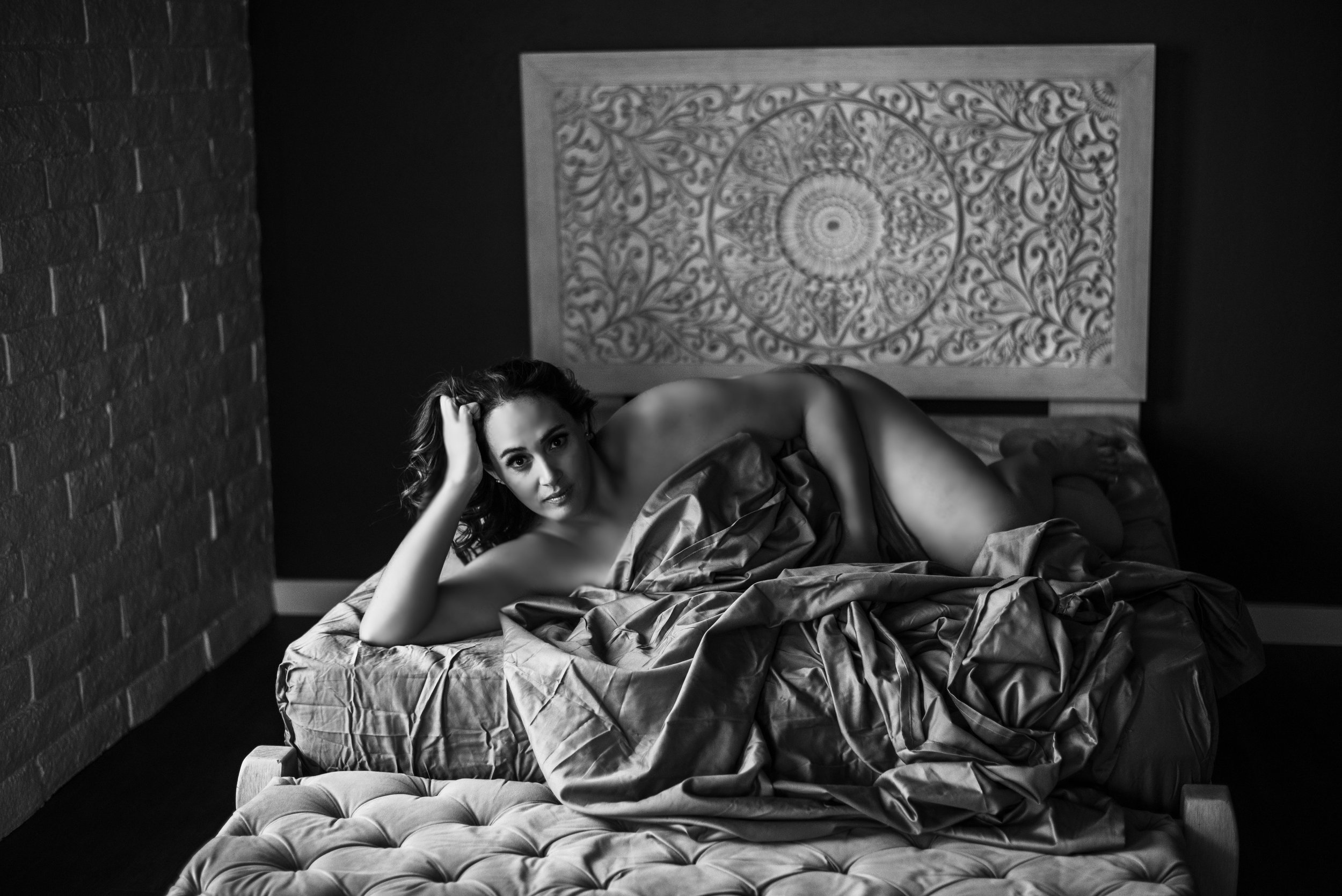 mid size plus size black and white silk sheet boudoir photography