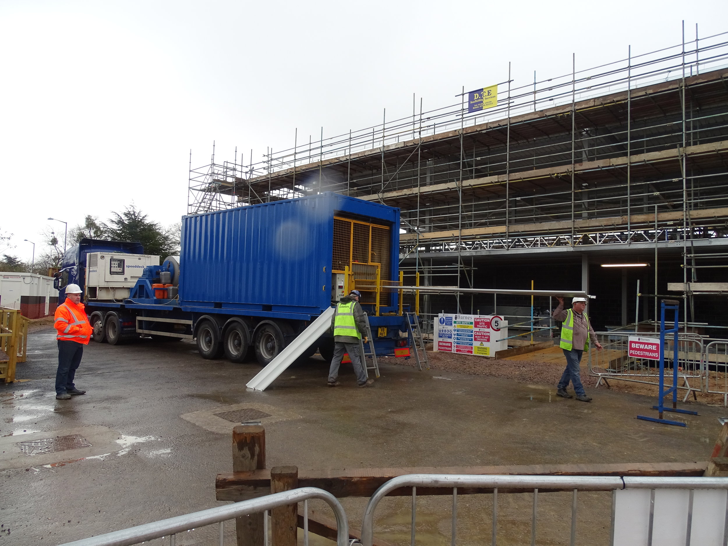 Onsite rolling of Omnis Exteriors SpeedDeck profile secret-fix standing seam roof sheets