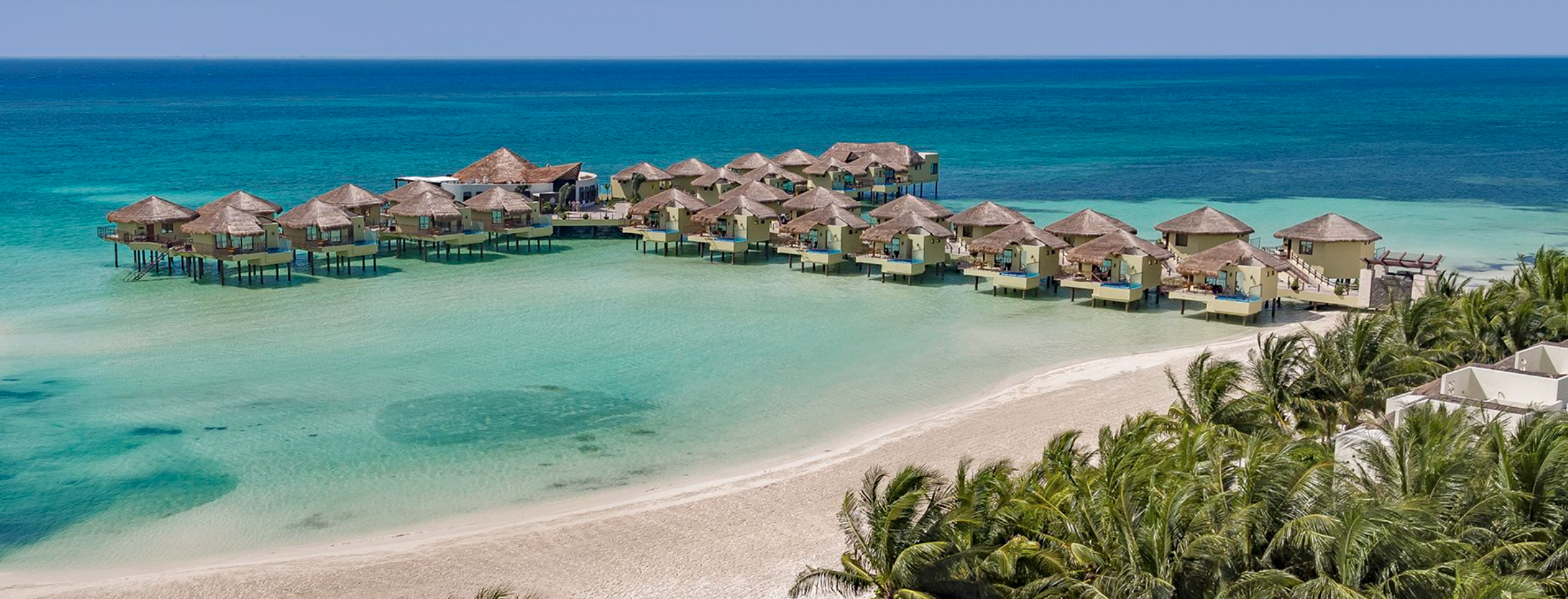 Palafitos Overwater Bungalows | Cancun | Mexico | Beach.png