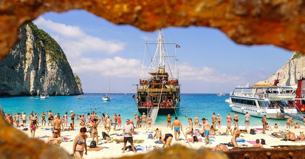 Navagio+Beach+%7C+Zakynthos+%7C+Greece+%7C+Tourists+%7C+Ships.jpg