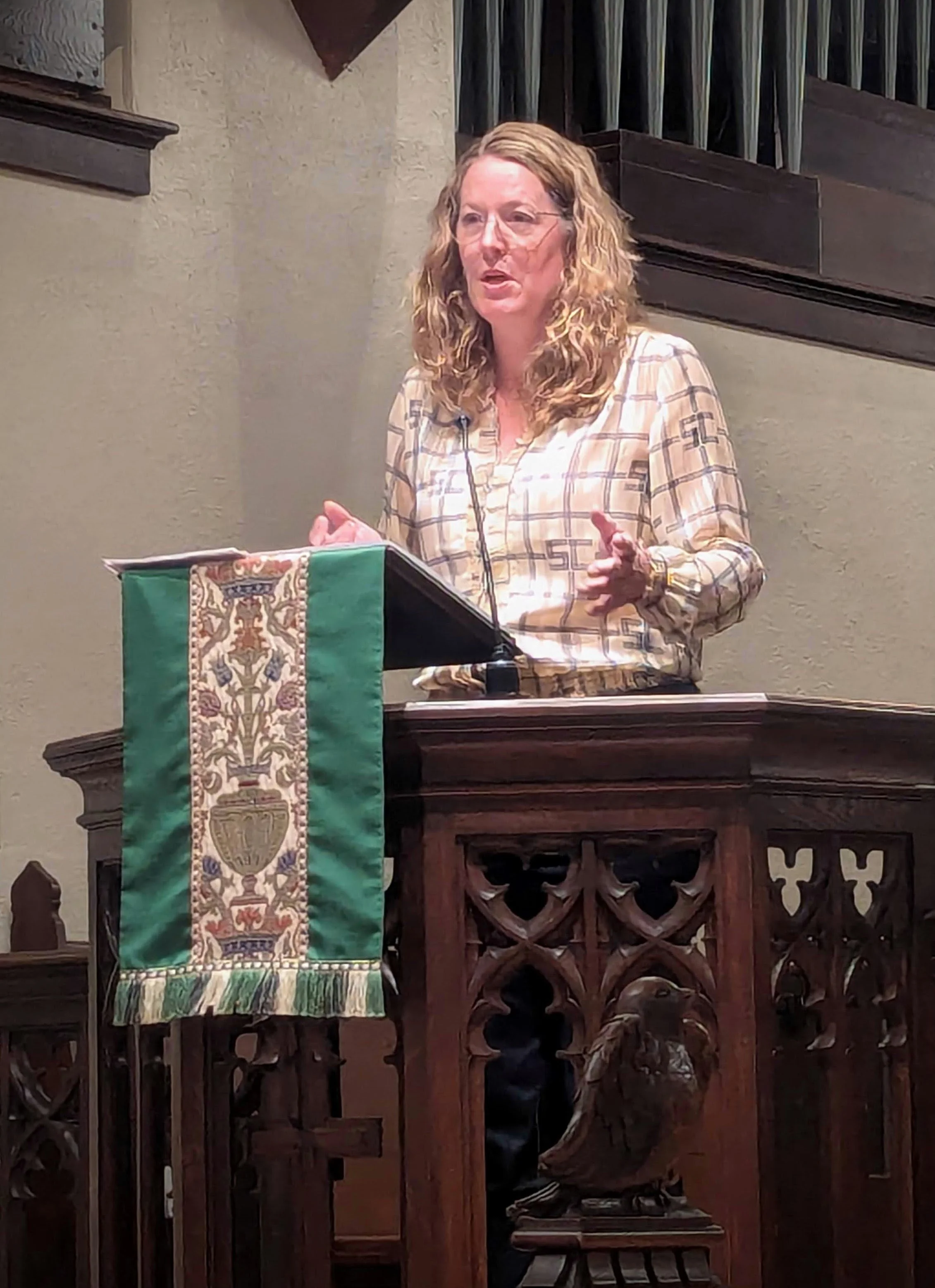 Jennifer Seggev speaks from the pulpit at St. John's.