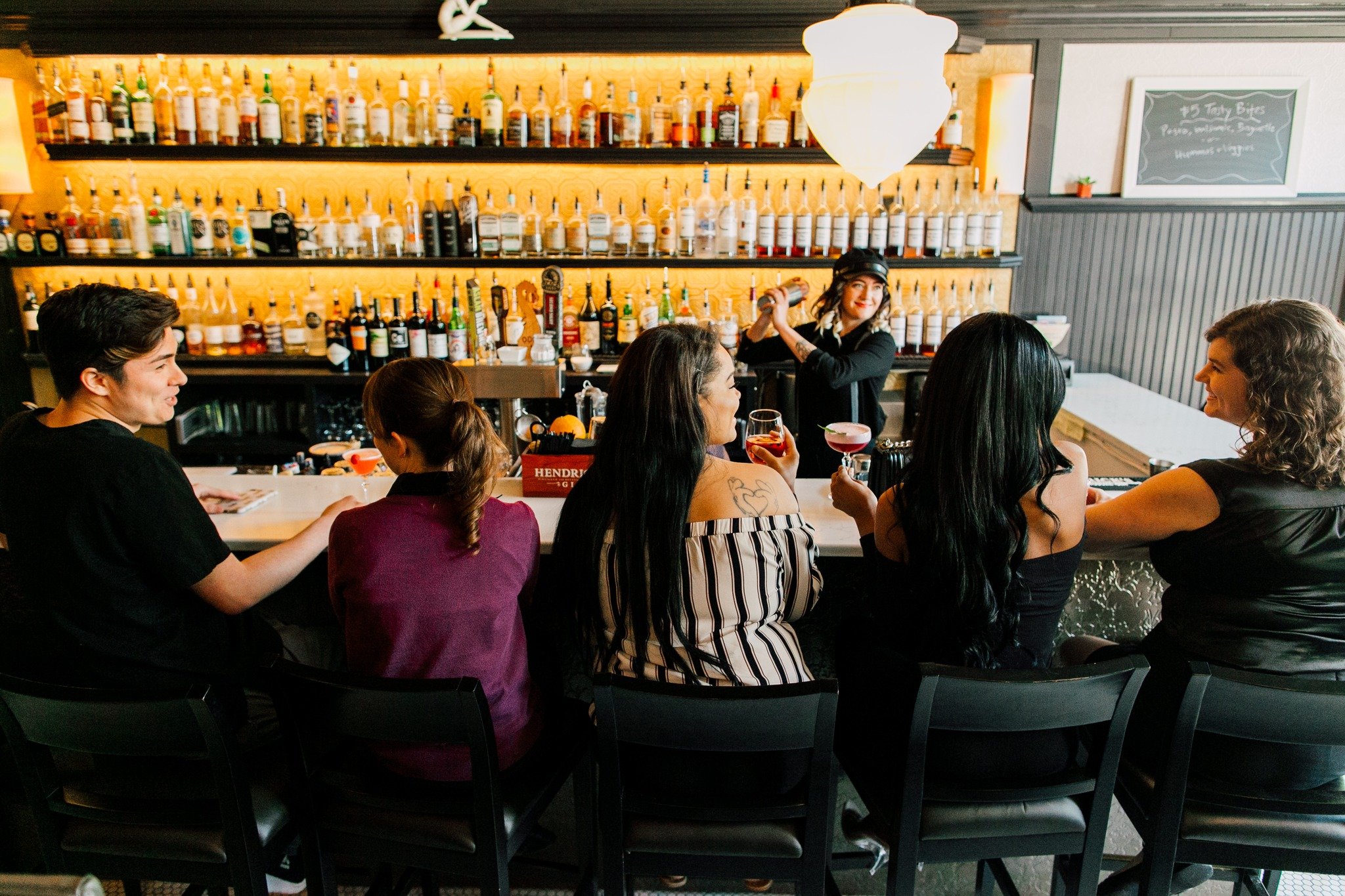 Let the wind work as a sign to breeze you into your favorite seat for your favorite sip.