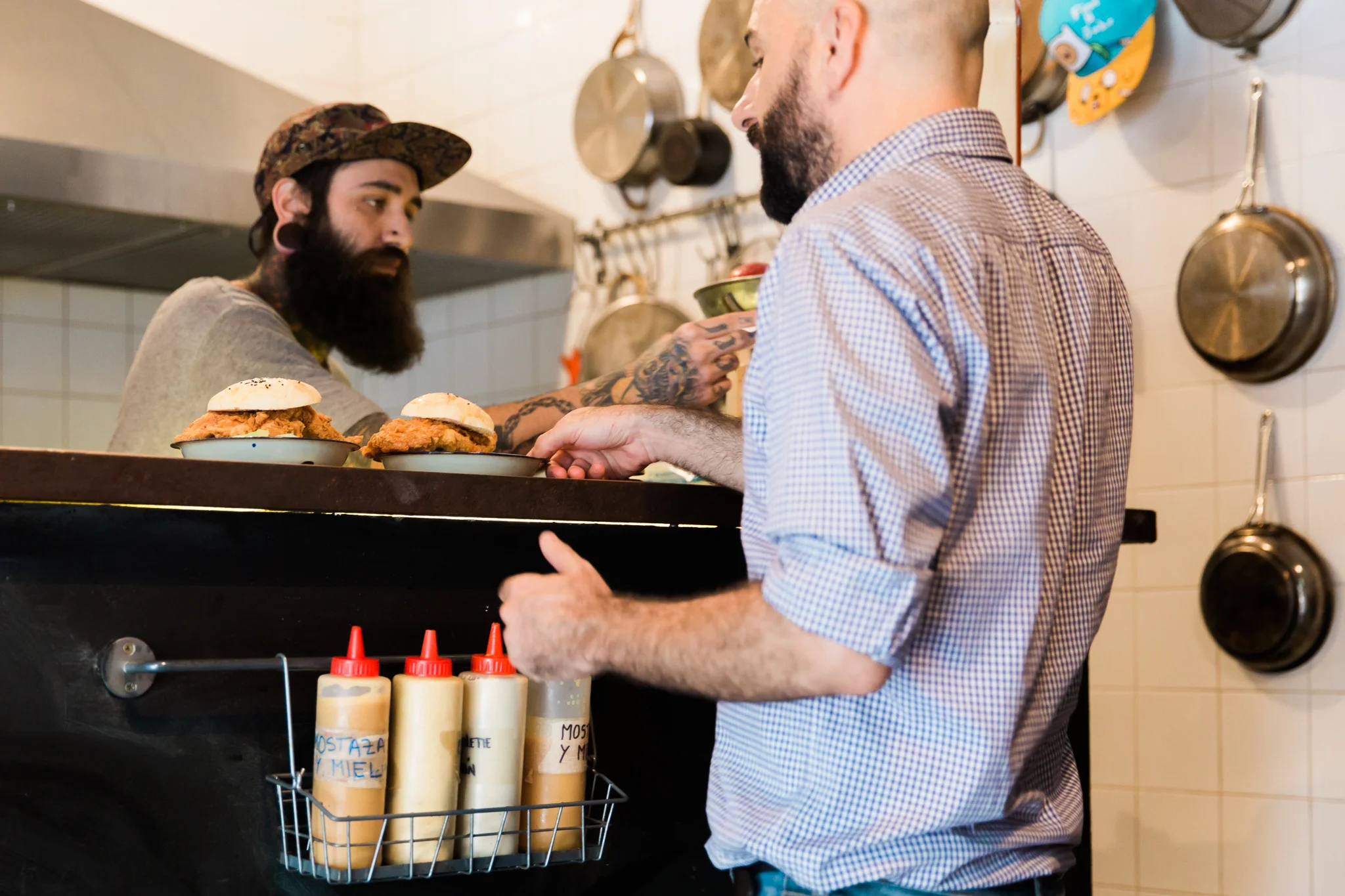Eugenio's favorite place for a warm-up beer is an under-the-radar snack spot he likes to call "the chicken window"—a no-frills joint serving up "magic in sandwich form."