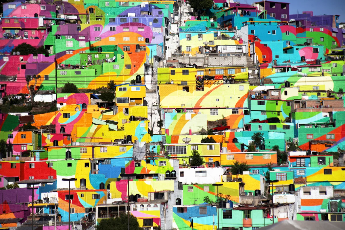 In 2015, one of Claudio's favorite local crews painted an entire neighborhood in Pachuca, the capital city of Hidalgo. Image by Germen Nuevo Muralismo Mexicano