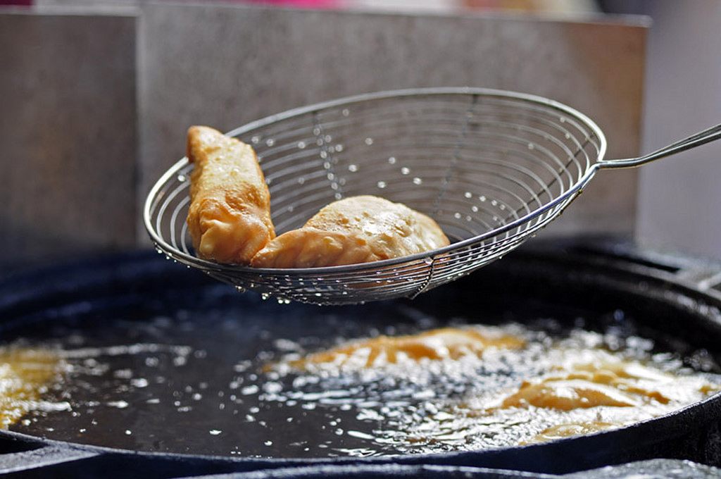 We dare you to resist these sputtering-hot market empanadas.