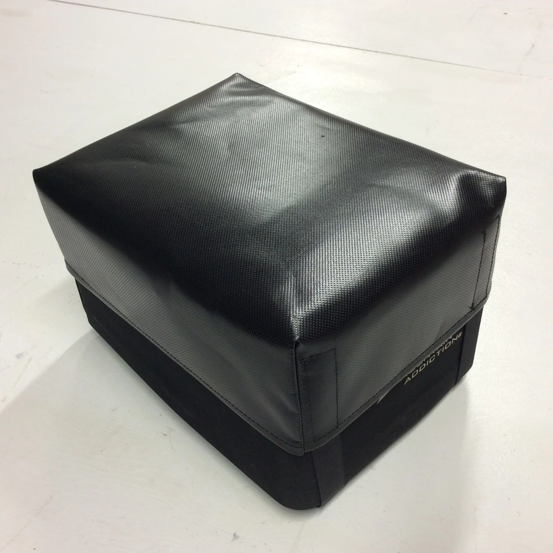 Mountain Addiction Storage Container Cover Model C Built to prevent moisture in the storage bag. Made from 18oz Apollo PVC vinyl, Sunstop thread and outdoor rated nylon strap. Available in Black only at this time. Price : $50.00 CAD + shipping For Purchasing information please go to the Contact Us