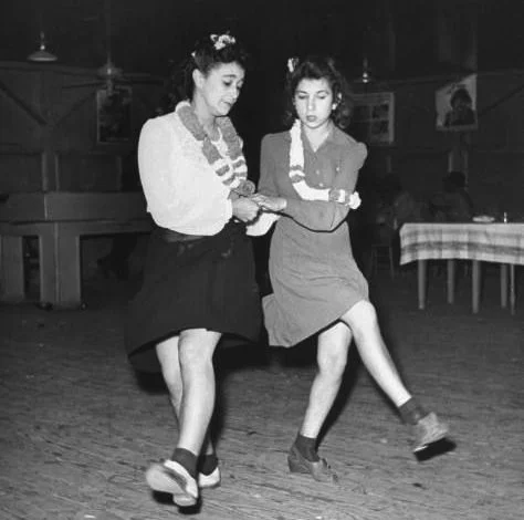 Young women dancing. Photograph by Peter Stackpole. Louisiana, USA, 1942.
