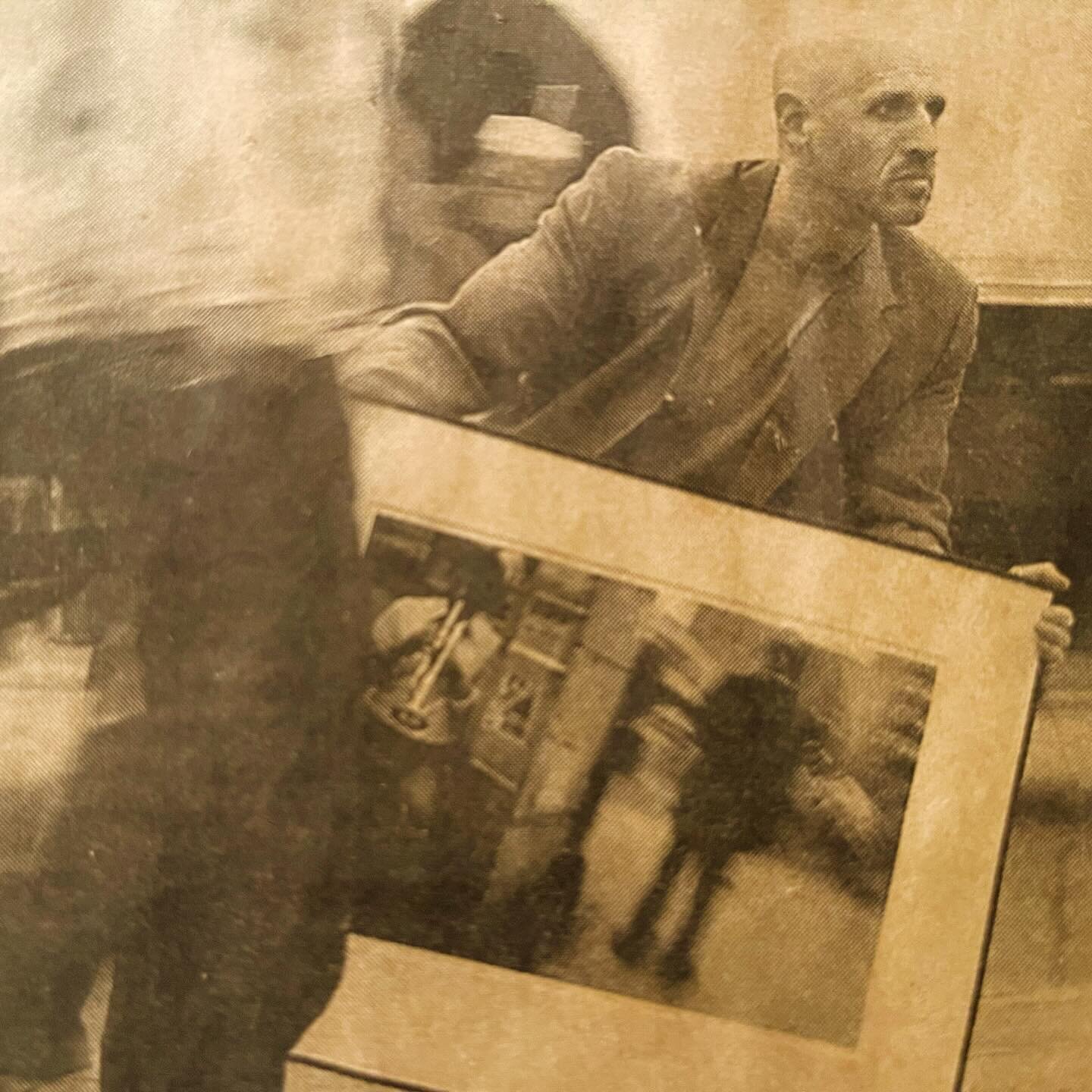 From a 1990s newspaper clip where they photographed me at the same spot&mdash;the southwest corner of Dundas and Yonge in Toronto&mdash;where I took the original photograph for the Liquid City image &quot;untitled no. 52,&quot; which I&rsquo;m holdin