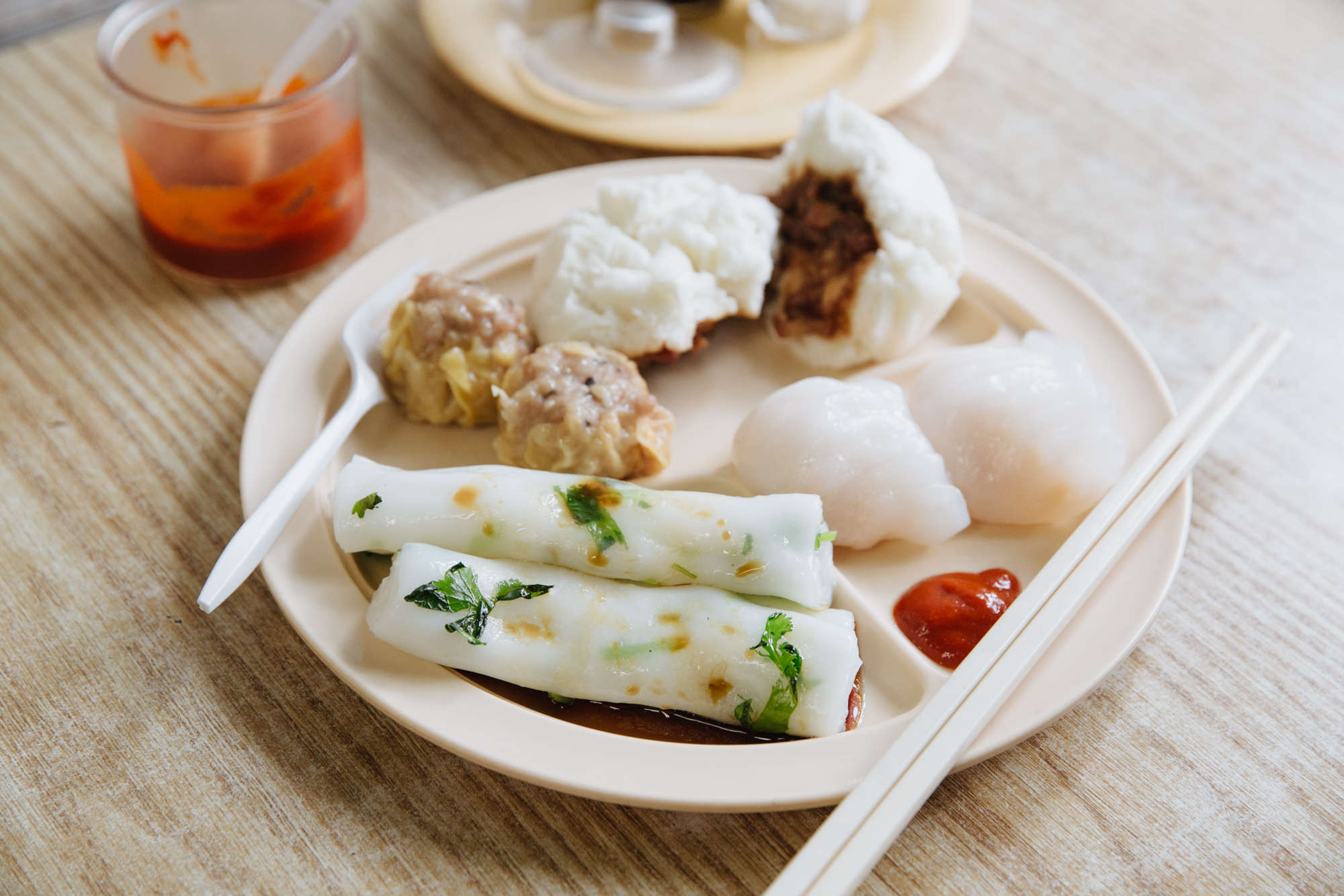  Rice rolls, char siu bao (steamed pork bun), har gow (shrimp dumpings) and siu mai (pork and shrimp dumplings). 