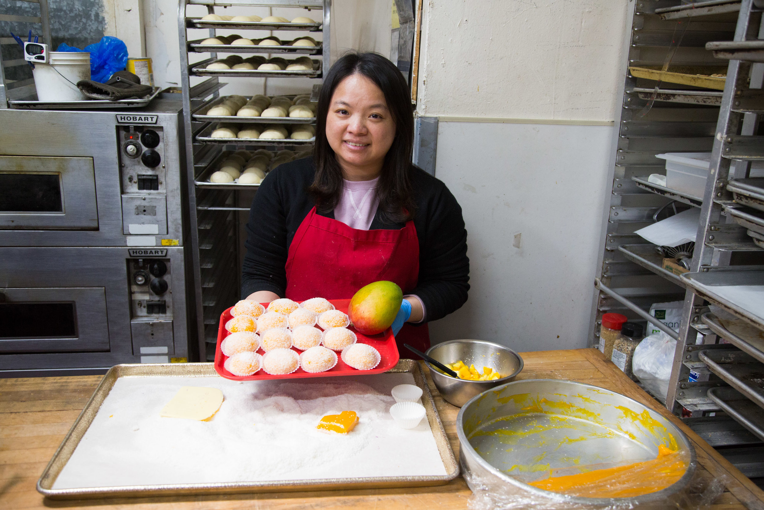  Owner Hannah Zhang makes mango mochi  