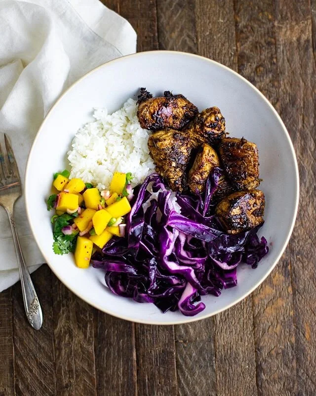 Finally back in the kitchen after being a little under the weather so here&rsquo;s what I whipped up today: jerk marinated chicken breast ( I use the seasoning blend from @savoryspiceshop), mango salsa, purple cabbage slaw &amp; jasmine rice. .
.
.
.