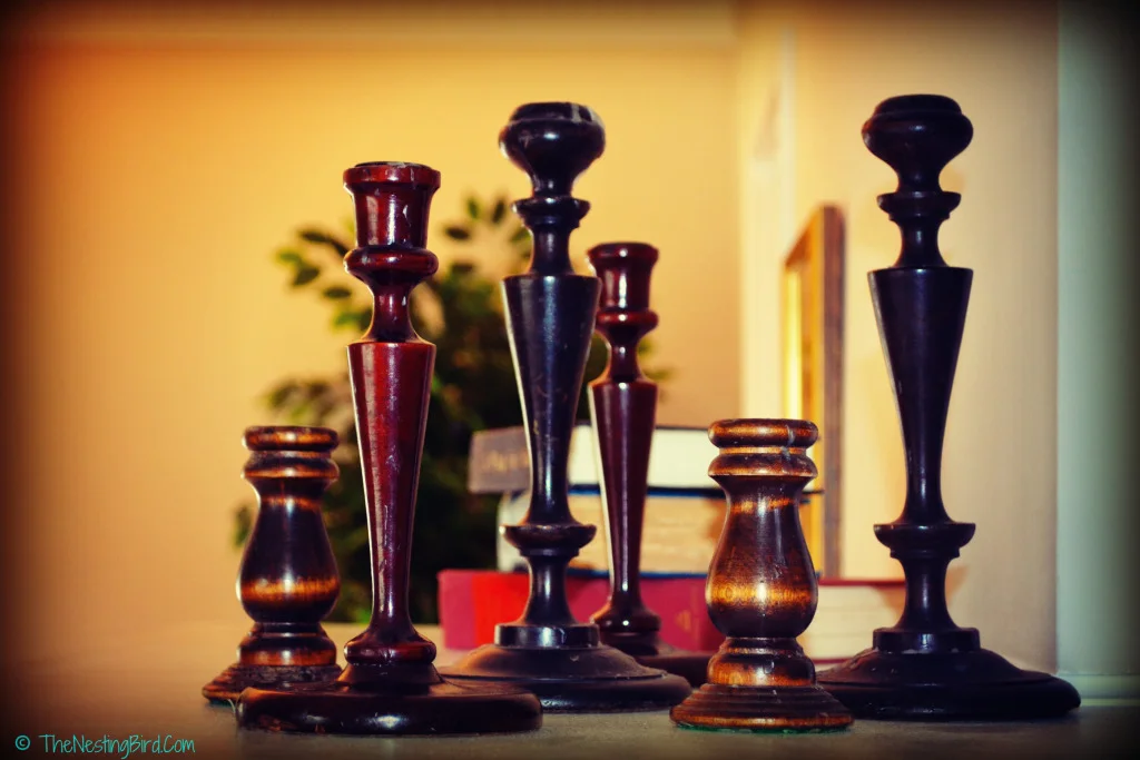 Various Wooden Candlesticks, placed together, instantly created a great focal point for this oversized mantel!