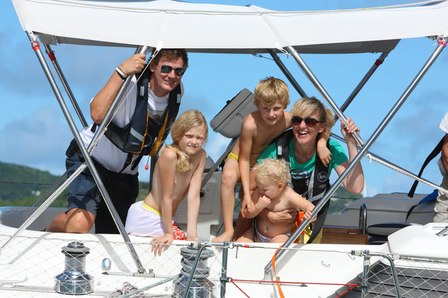 Caspar's family together on their boat after crossing the Atlantic