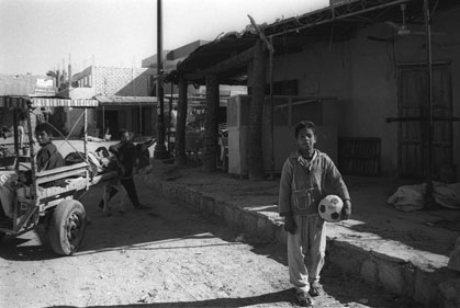 Boy with football, Siwa