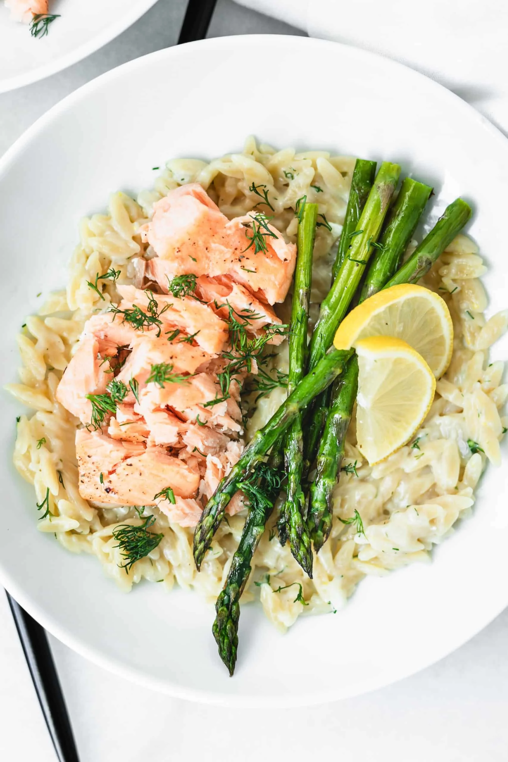 Creamy lemon parmesan orzo with salmon and asparagus