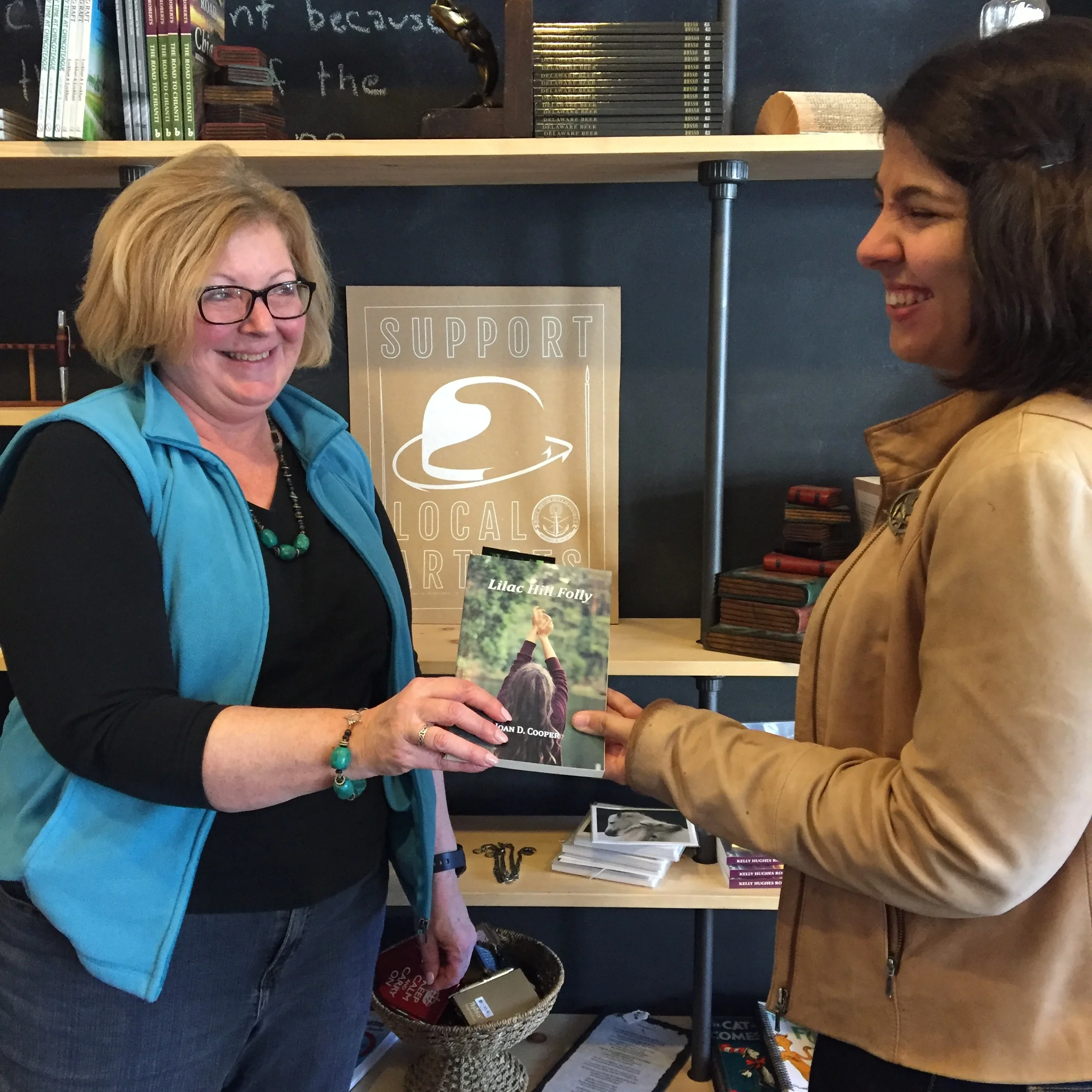 Joan Cooper, left, poses for a totally casual photo with local reporter, Katie Tabeling.