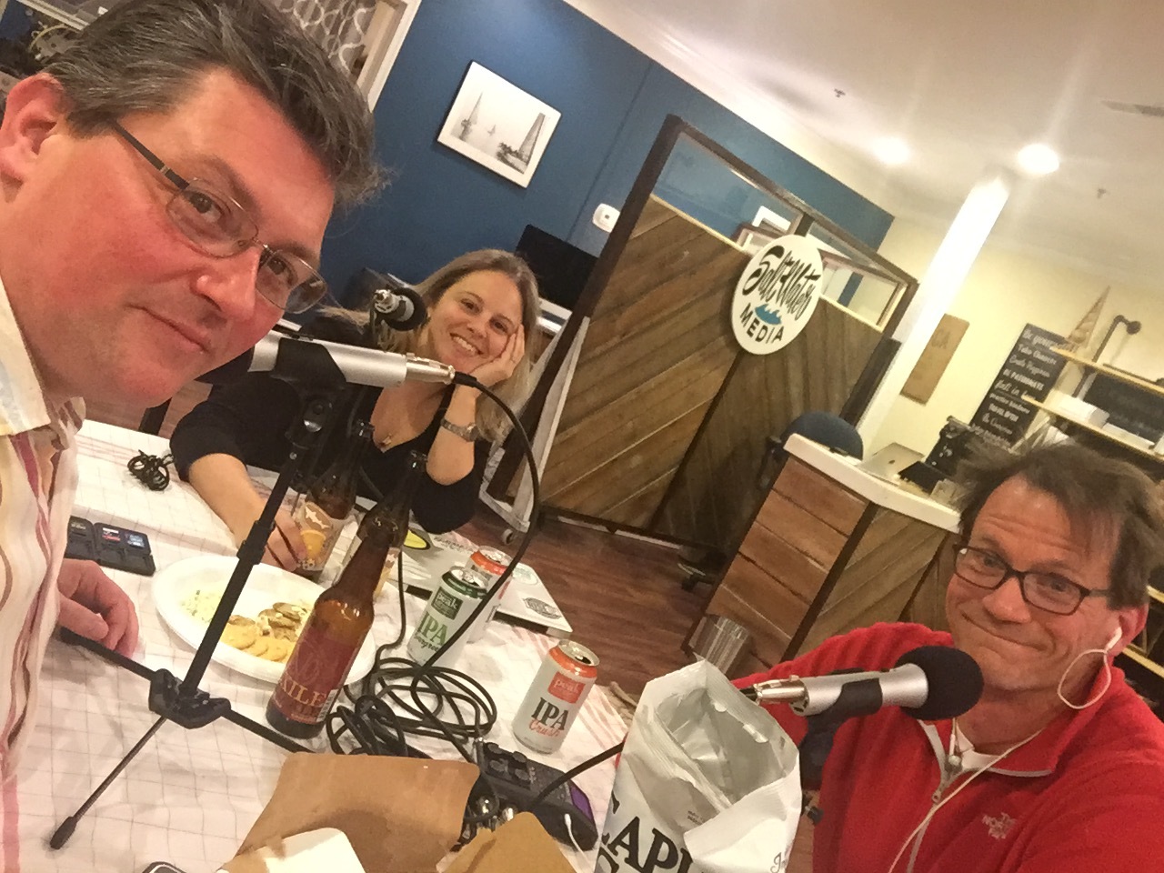 Tony, Steph, and Jeff and the popcorn and beer debris field of a Writers' Roundtable.