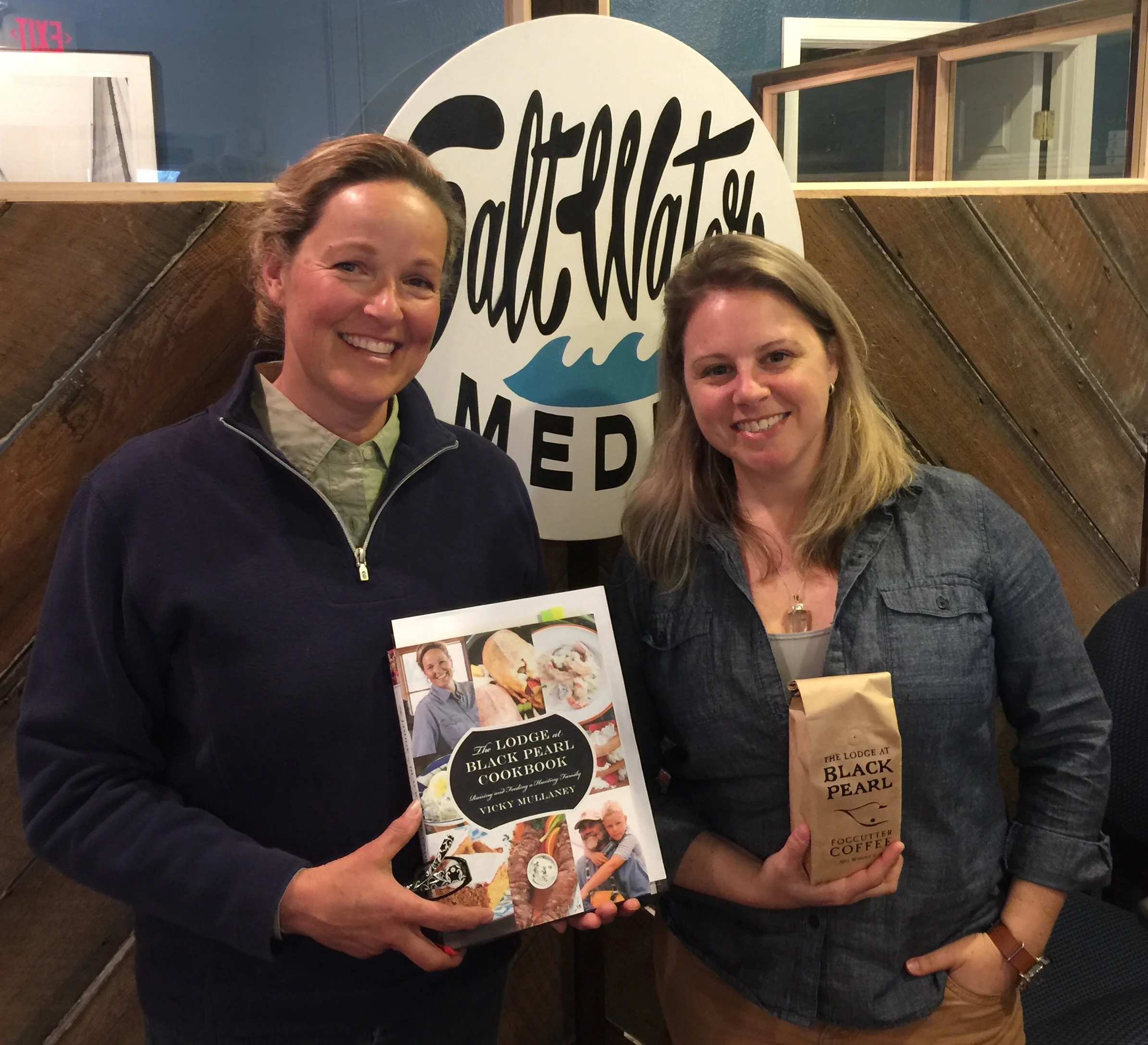 Vicky Mullaney shows off her newest creation, The Lodge at Black Pearl Cookbook, and her coffee blend, which she gave to Stephanie.