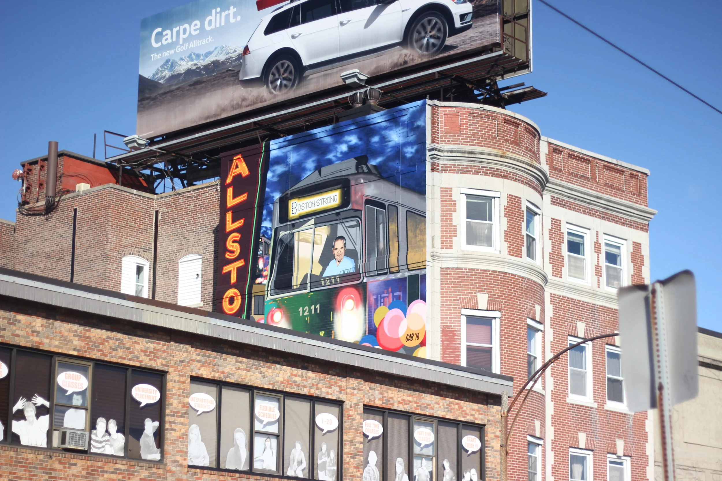 Allston wakes up this morning and sighs a hello to a clear blue sky. The rumble of the T doesn't overtake the clinking of coffee cups, the doors to little restaurants swing open greeting guests to the light ringing of bells. Allston, for all it has …