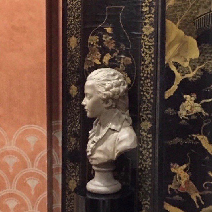 Details from our Tribeca project. 18th C Coromandel Screen &amp; 18th C terra-cotta bust. Decorative stencil on Venetian plaster and faux porphyry column by @lostubu #buzzkelly #buzzkellyinteriors