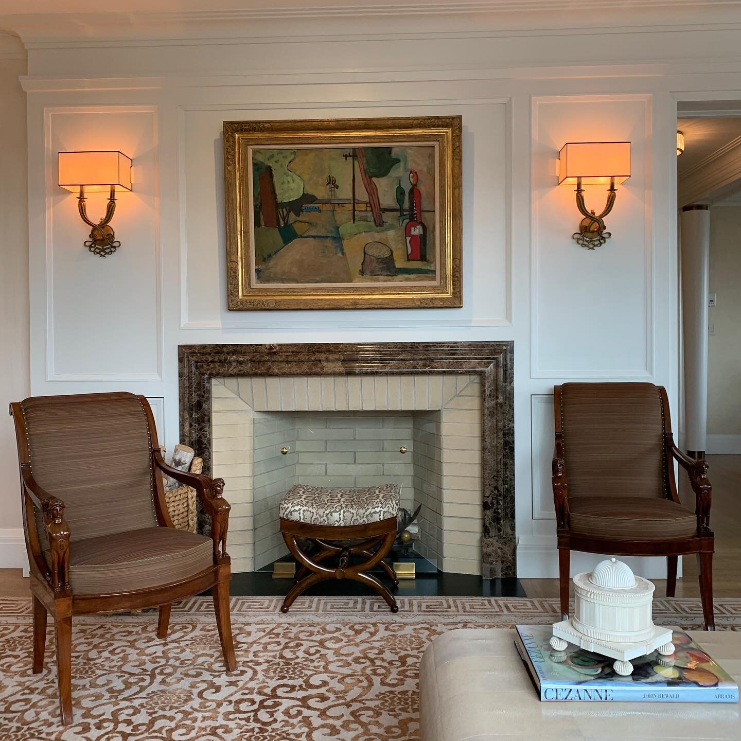 Rainy day at our Boston pied-à-terre project #jacobchairs #leleausconces #poilleratandirons #buzzkelly #buzzkellyinteriors #christianricciarchitecture