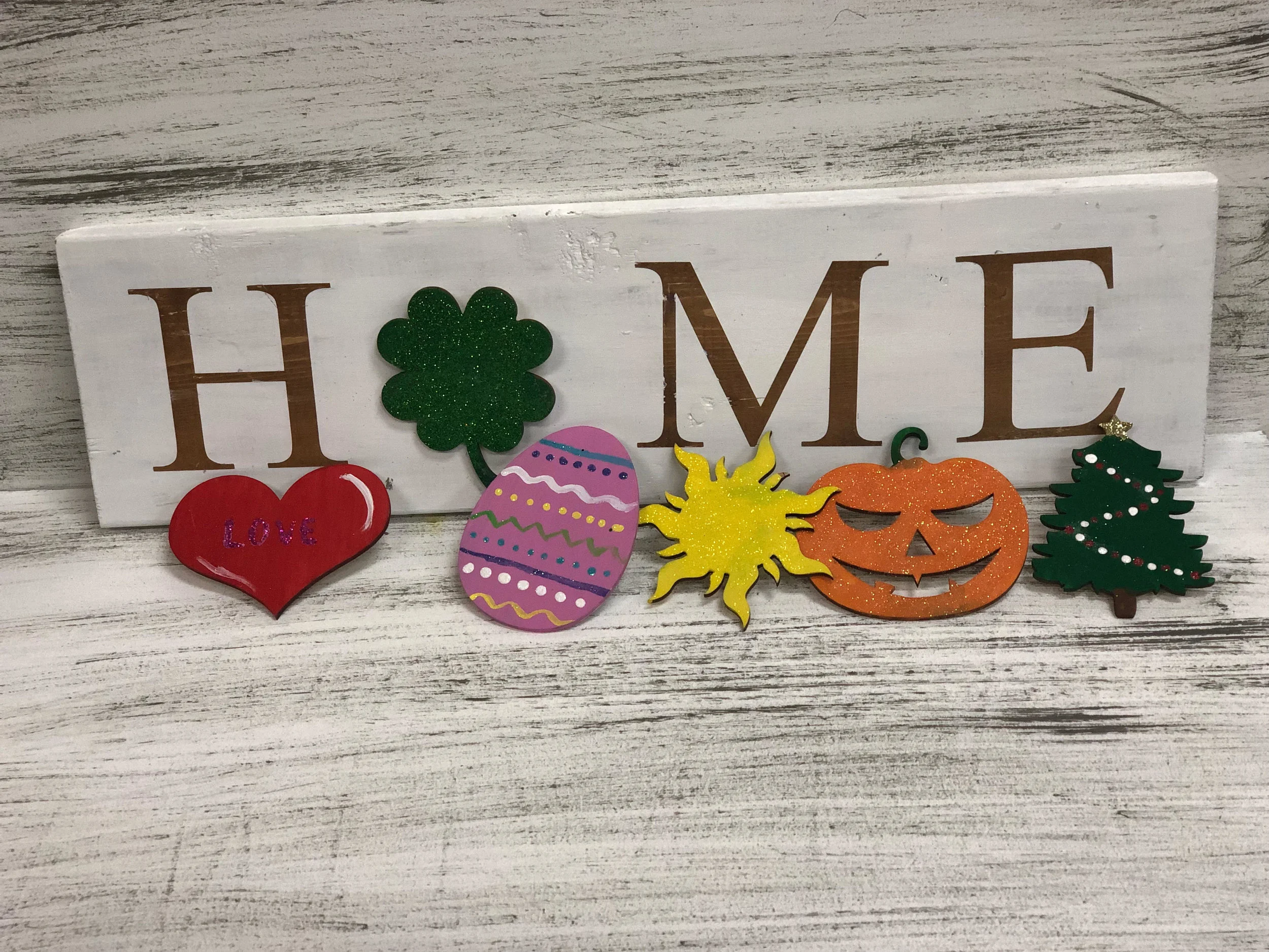 $45, comes with 6 interchangeable wood cut outs Heart, Shamrock, Easter Egg, Sun, Pumpkin, Christmas Tree