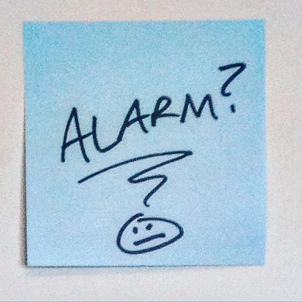 Post-it note found on a garage door.