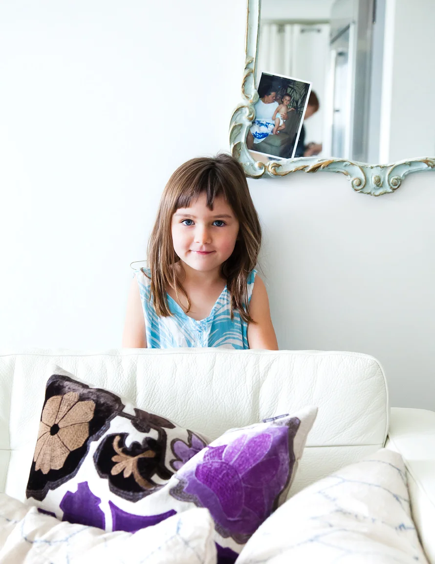 KidGirlBehindTheCouch.jpg