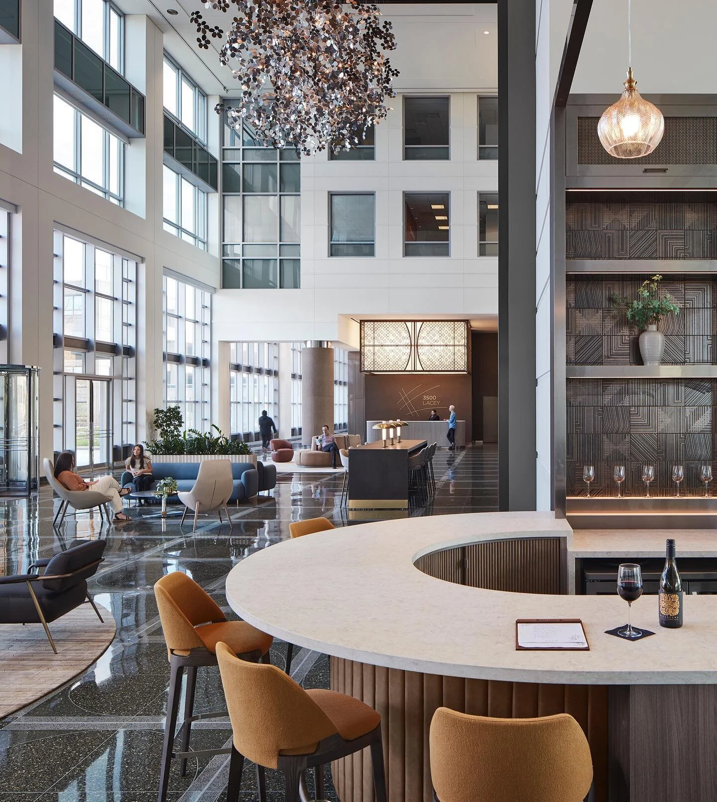 The coffee and wine bar at 3500 Lacey has already played host to many happy hours thanks to its seamless integration into the lobby. // #architecture #design #office #lobby #interiors #interiordesign #okwarchitects 📸: @kendallaileen
