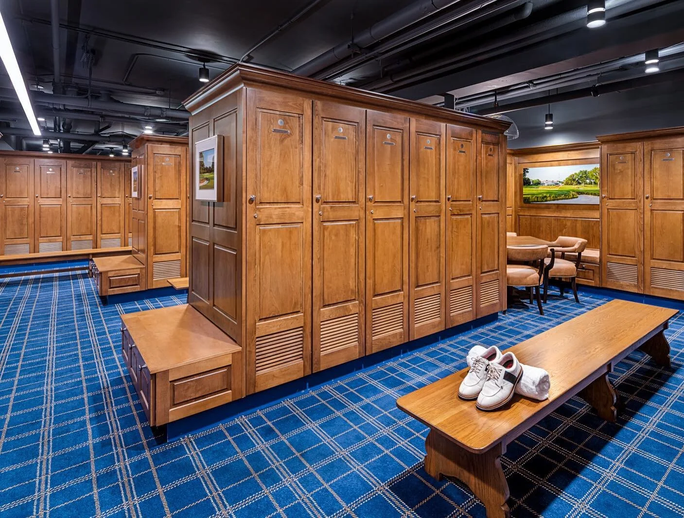 Our third locker room project for the week is a cozy renovation of an existing facility. Staying true to the traditions and history of the Club, we refreshed the space with new carpet and upholstery, an open ceiling, new fixtures, and refinished lock