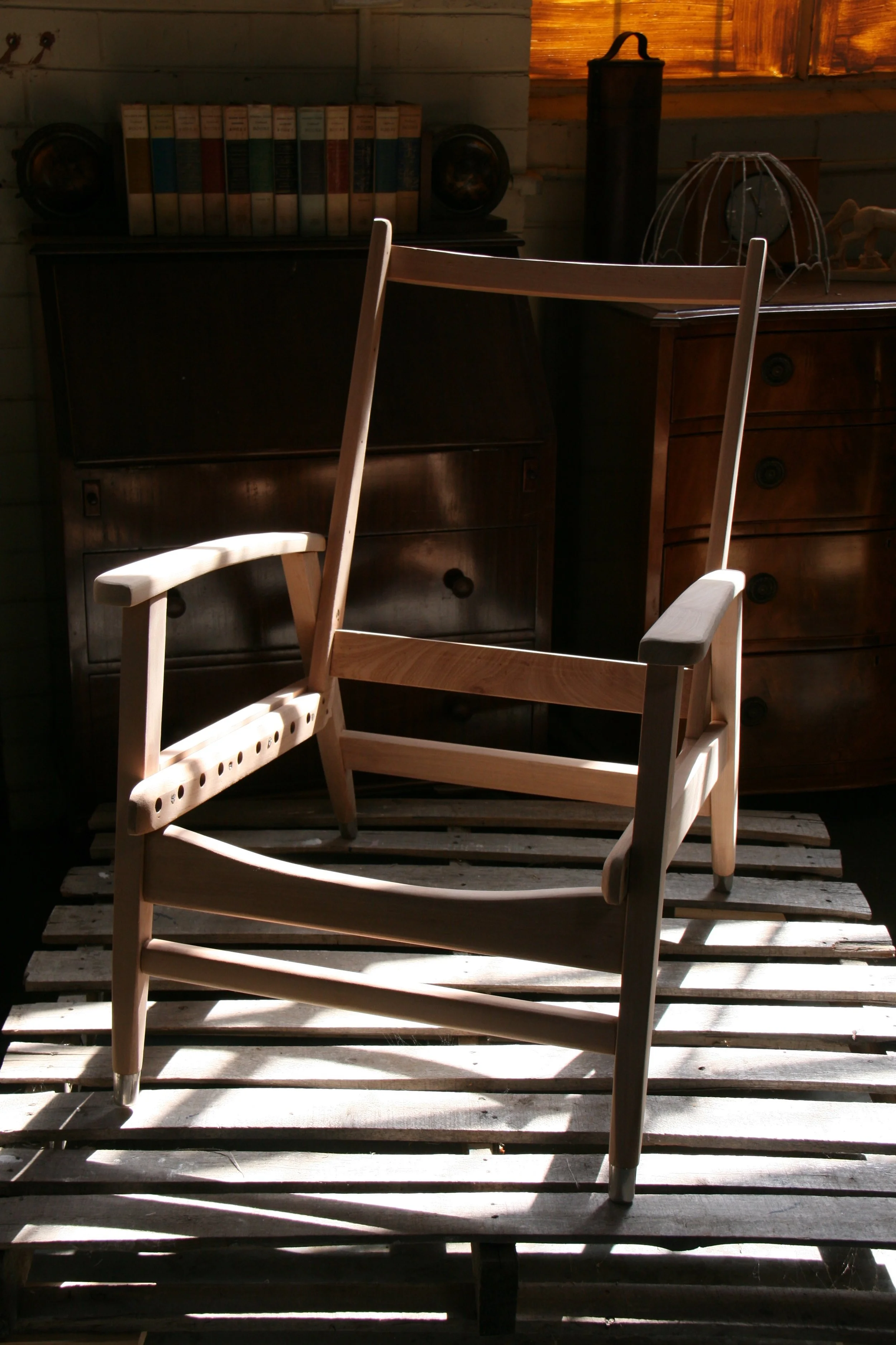 Our "Mid-century Lovers" armchair is firmly back together again.