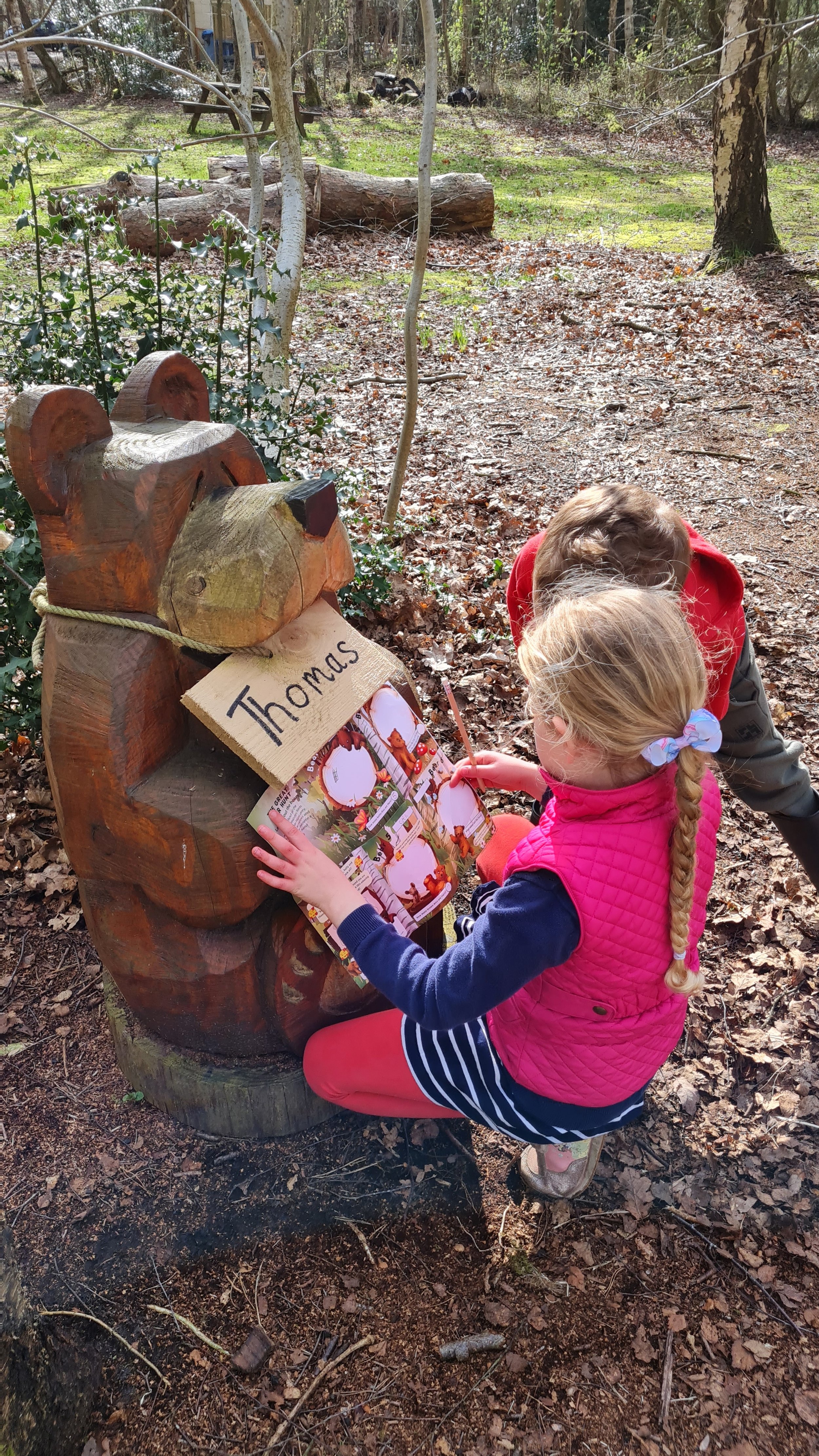 Young girl finding the bear