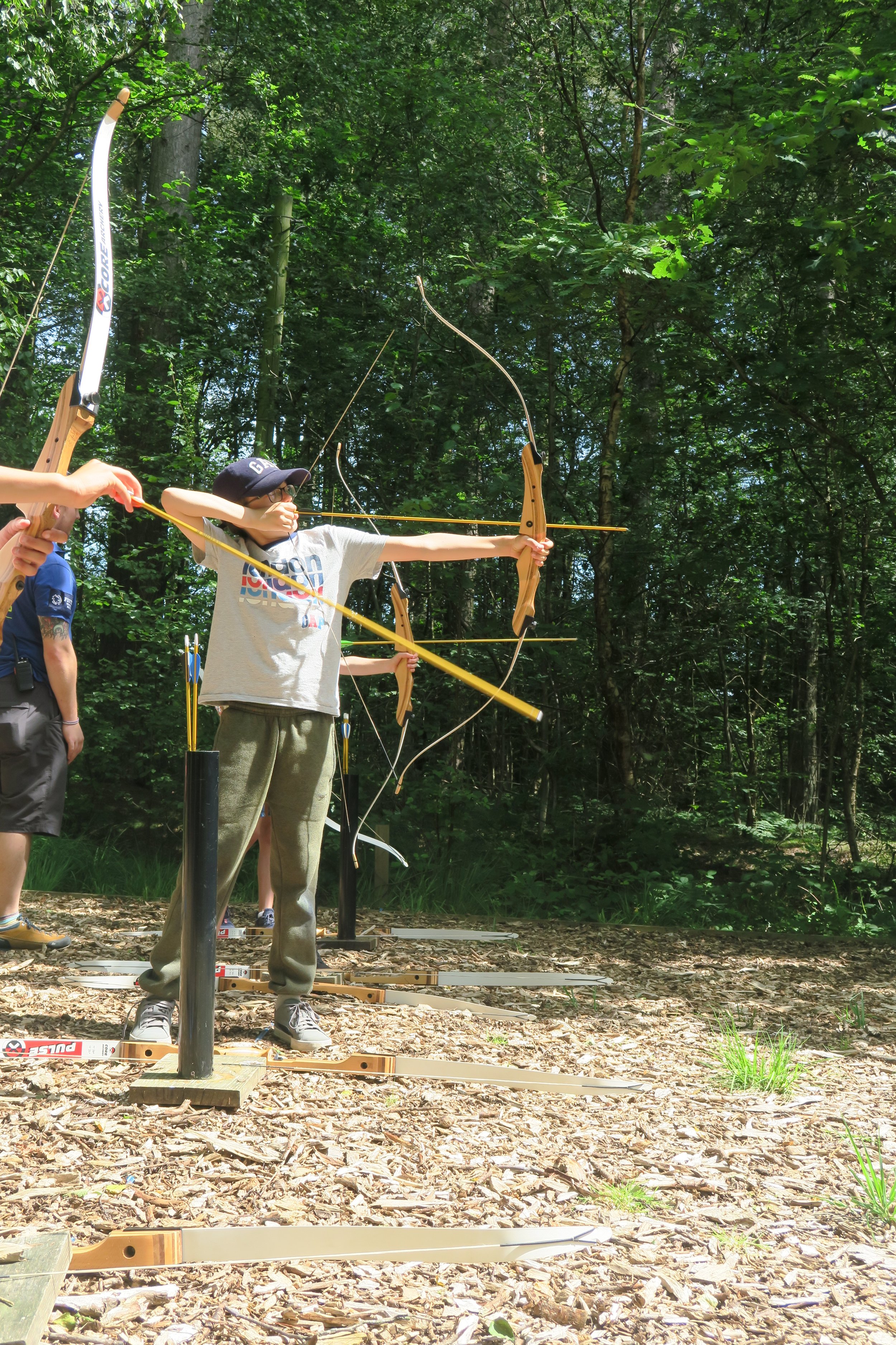 children on an archery range