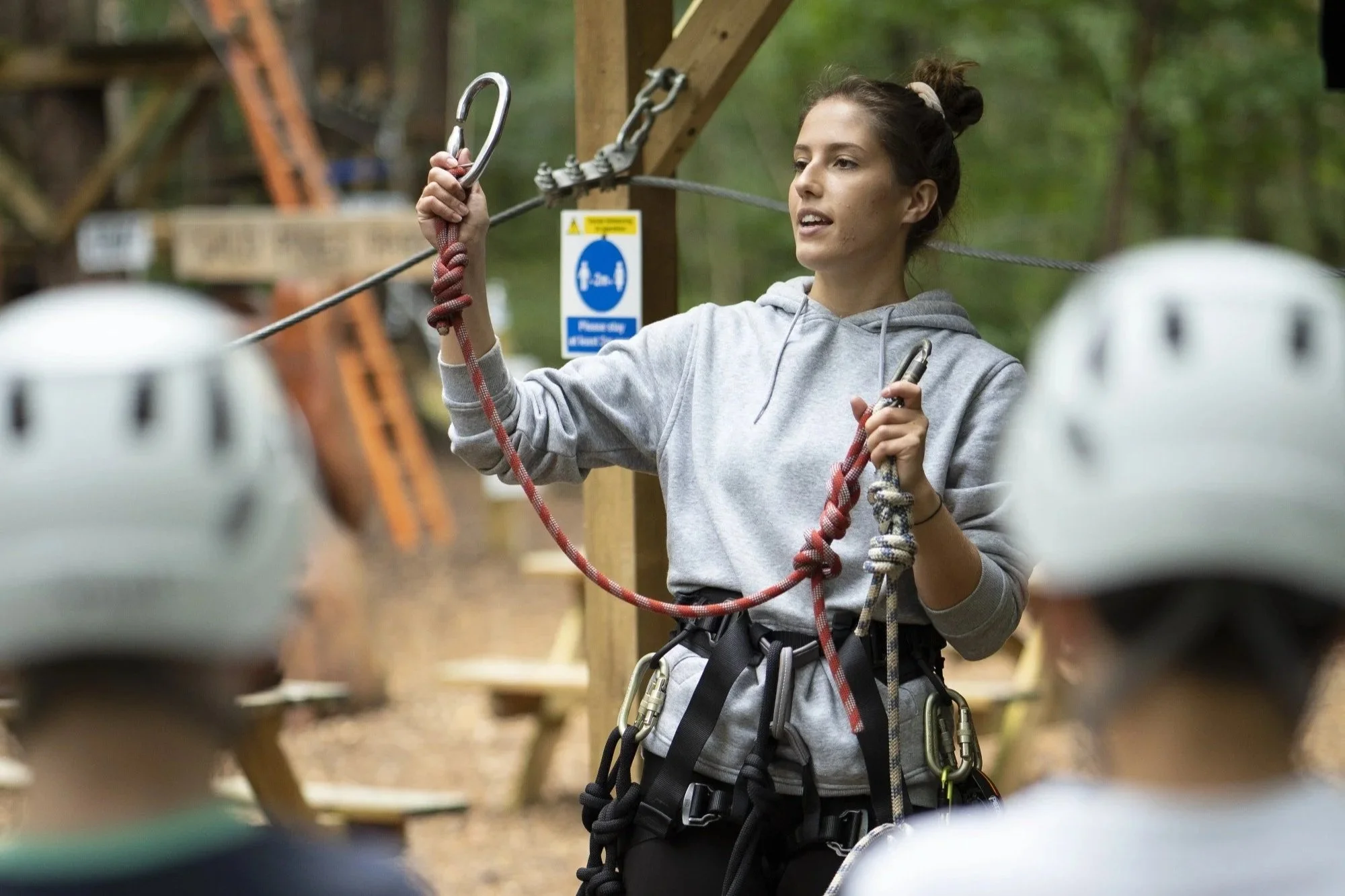 Secondary school students taking on outdoor challenges at Wild Pines Park