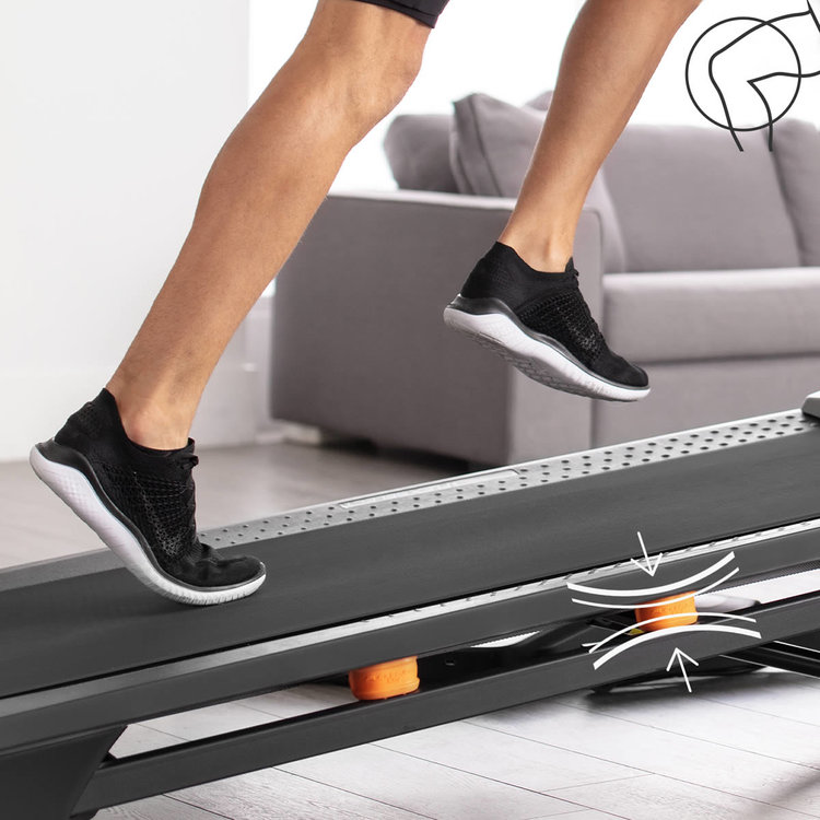 To activate the Flex Select cushioning option on the T Series treadmills each orange cushioning isolator, on each side of the deck, has to be turned one half turn for impact reduction
