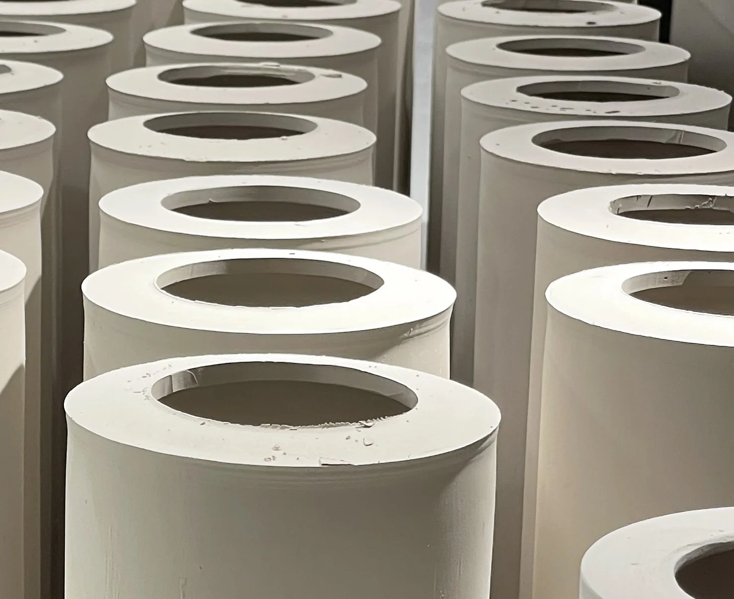 Freshly cast cylinders waiting to be made round again